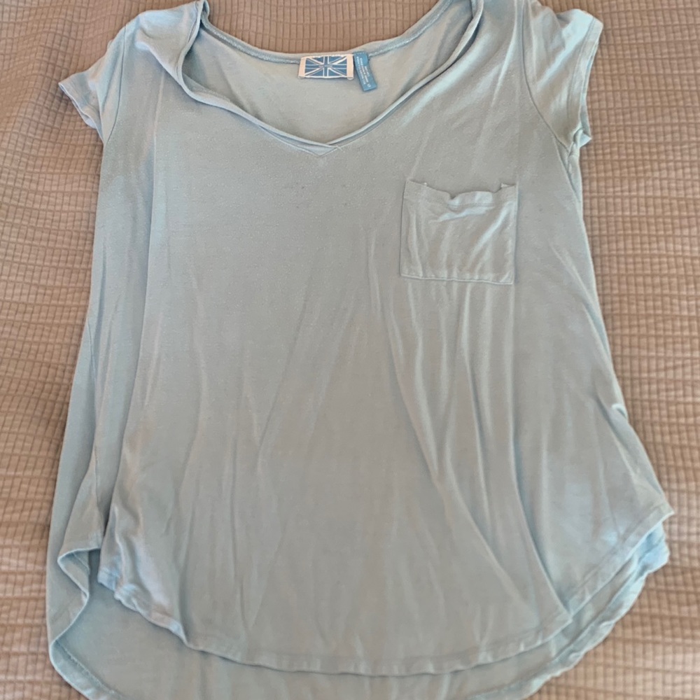 a baby blue t shirt